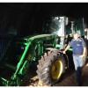 Detective Sergeant Neville Ross by the $120,000 tractor recovered near Taupo