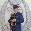 Superintendent John Price with 9 wk old Police puppy Wookie