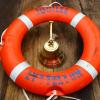 Ship's bell and lifebuoy recovered from the FV Jubilee by the Royal New Zealand Navy's Operational Diving Team