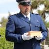 Constable Craig Bennett holds the final remains of Jessie Marguerite Fendall, which were reunited with her body on Friday.