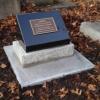 The memorial plaque erected by Police over the unmarked grave