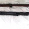 These firearms were among items recovered in the searches