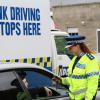 Inspector Tania Baron breath-tests a driver as part of a drink drive operation in Oamaru over the weekend.