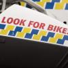 A Police motorcycle carries a message for motorists