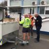  Senior Sergeant Mike Stevenson receives some feedback on his BBQ skills.