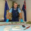 Senior Constable Brent Mitchell with seizures made in Otago