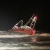 A capsized boat off Waimairi beach
