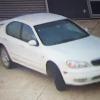 Police are seeking information on a white Nissan Cefiro. 