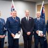 Presentation to Senior Sergeant Manning and Senior Sergeant Carmody