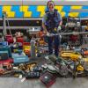 Constable Erin Doherty with some of the stolen tools recovered on Wednesday