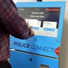 Photo of someone using Police Connect (indoor)
