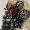 Two motorbikes in a garage 