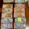More than $100,000 in cash was located at one address during search warrants
