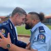 Photo of Commissioner Andrew Coster with Constable Dominic Malo