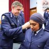 Constable Ali receives her epaulettes after attestation in November 2020 from Commissioner of Police, Andrew Coster.