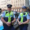 Constables Daniel Stone, in the forage cap, and Gertrud Kikajon in the new cap