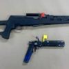 Two unlawful firearms recovered from the search warrants