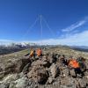 Fiordland LandSAR erecting an electronic repeater at the commencement of search 