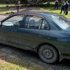 Police are seeking sightings of this green 1998 Mitsubishi Lancer