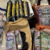 Cash seized during 17 search warrants across Auckland