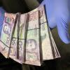 Approximately $10,000 in cash was discovered in the vehicle