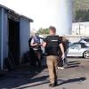 Police and Customs officers executed simultaneous warrants in Wellington and Christchurch yesterday.