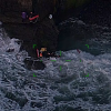 Police and Muriwai Volunteer Lifeguard Service rescued two people trapped on rocks yesterday evening.