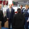 Police and the local mayor visited local businesses