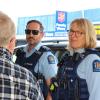 Sergeant Dalbeth and Inspector Nordstrom talk with the public in Dargaville