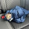 Falcon in patrol car