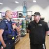 Police talking with local businesses
