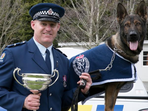Senior Constable Blair Spalding and Rush after their win in the national championships in September.