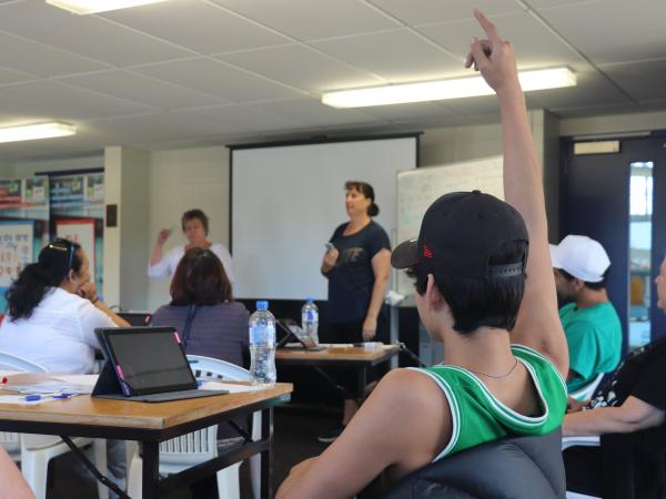 Clutha Council Road Safety Coordinator Rachel Harrison (standing, left) and Constable Rochelle Gordon (standing, right) at learn