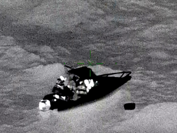 Constables Jordan Crowe and Ben Mason enlisted the help of another boatie to retrieve the pair from the ocean.
