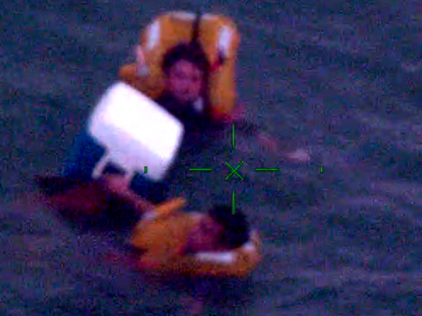 The pair had headed out for a fish from Te Mata when a wave overturned their boat.