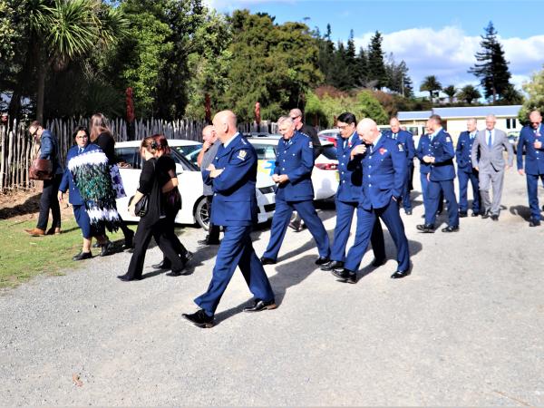 Colleagues, friends and family walk onto Waikawa Marae for Tracey's pōwhiri.