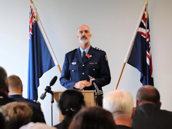 Inspector Grant Tetzlaff addresses the audience.
