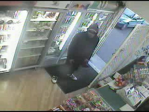 CCTV image of offender in Knighton dairy