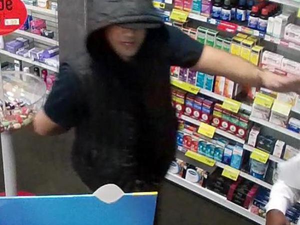  7. Radius Pharmacy - 10 July/Full body image of offender
