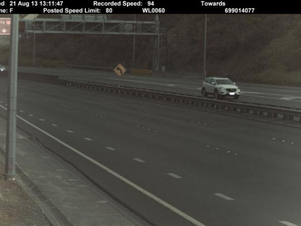 The camera has detected the white SUV in the Northbound lane travelling at 94 km/h - 14 km/h over the posted speed limit.