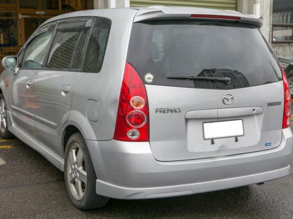 Silver Mazda Premacy station wagon, registration EWR953