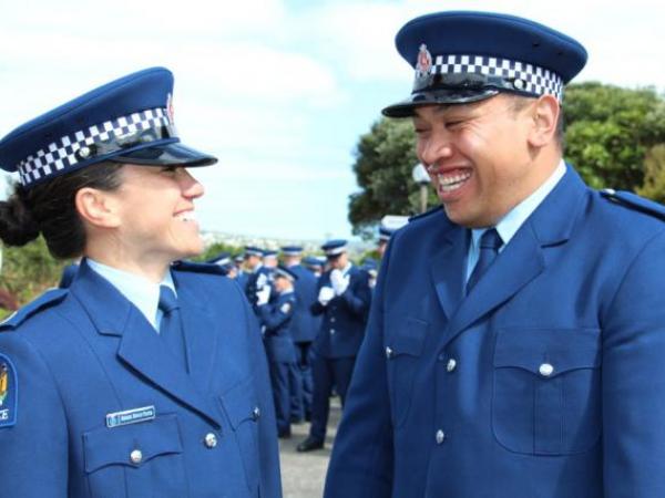 Const. Bernie Boyle-Tiatia and new constable Steven Sula, delighted at his success. 