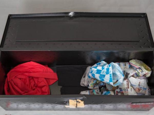 The contents of a lock box which contains ContacNT. The lock box was seized during 40 search warrants acroos Auckland and Waikato.