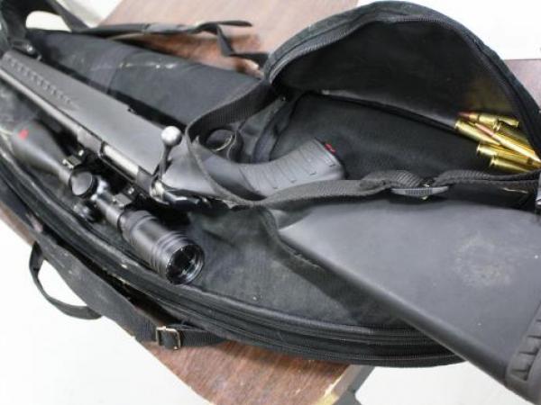 This .308 calibre rifle and ammunition was taken from one car and recovered by Police