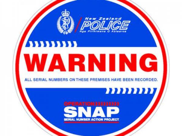 Operation SNAP warning sticker