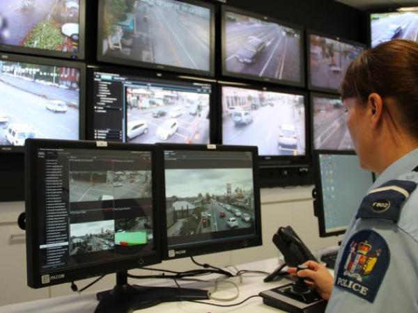 Camera operator, Sen Const Jenine O'Malley, in the Christchurch crime camera control room.