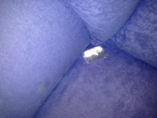 A small packet of methamphetamine found in the back of a sofa