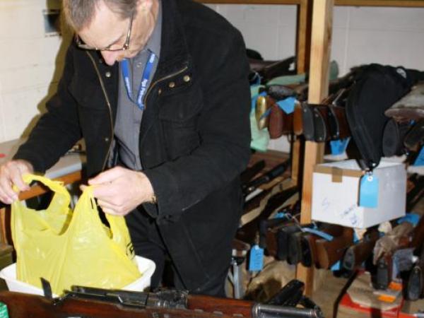 Waikato Arms Officer inspects some recovered illegally obtained ammunition