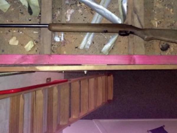 One of three .22cal rifles discovered