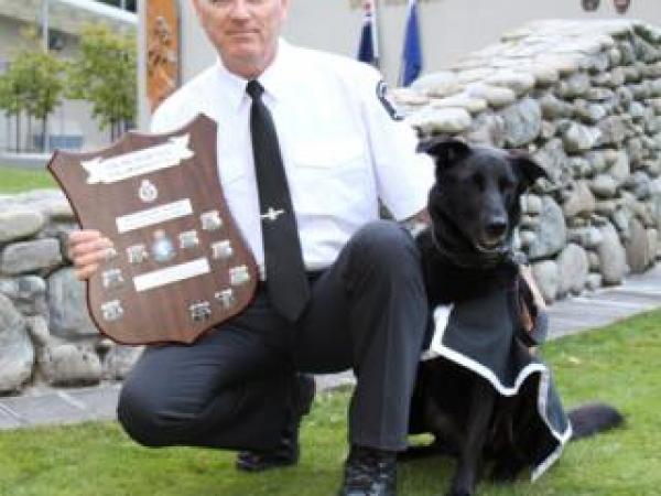 Explosive detector dog champions,  AVSEC Officer Harvey Jefferies and Shadow. 